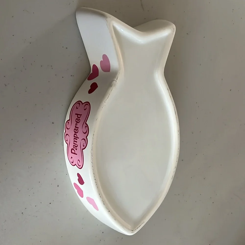 Cat food bowl in a fish style for food. Pampered